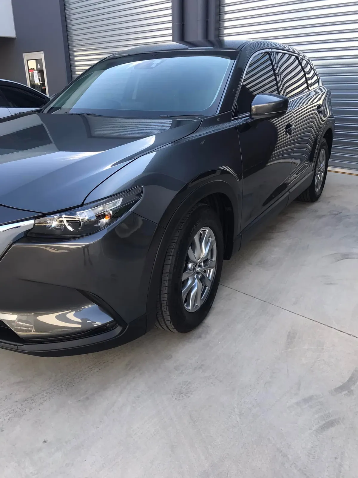 Car with professional window tint by KEN Express