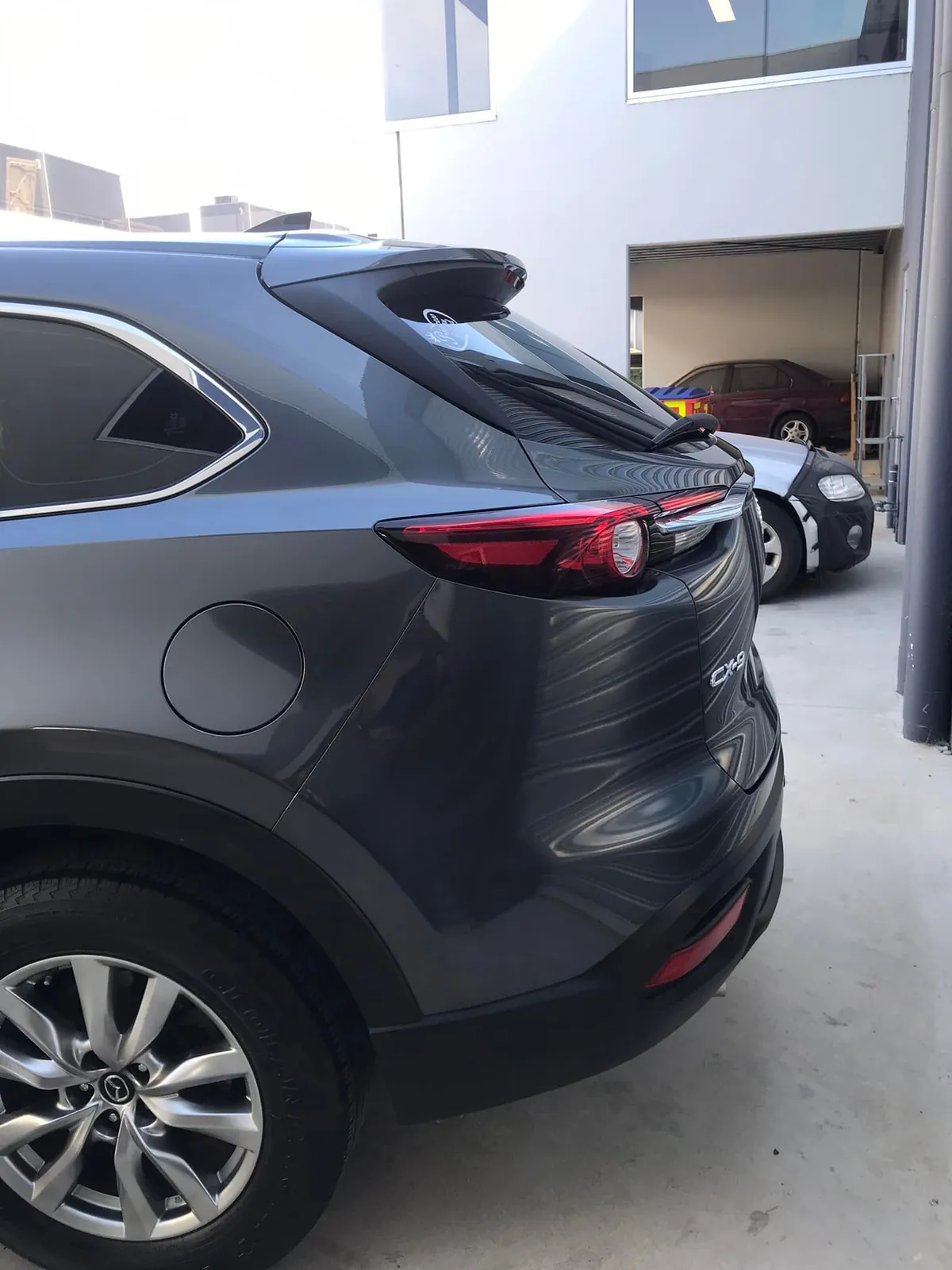Car with professional window tint by KEN Express