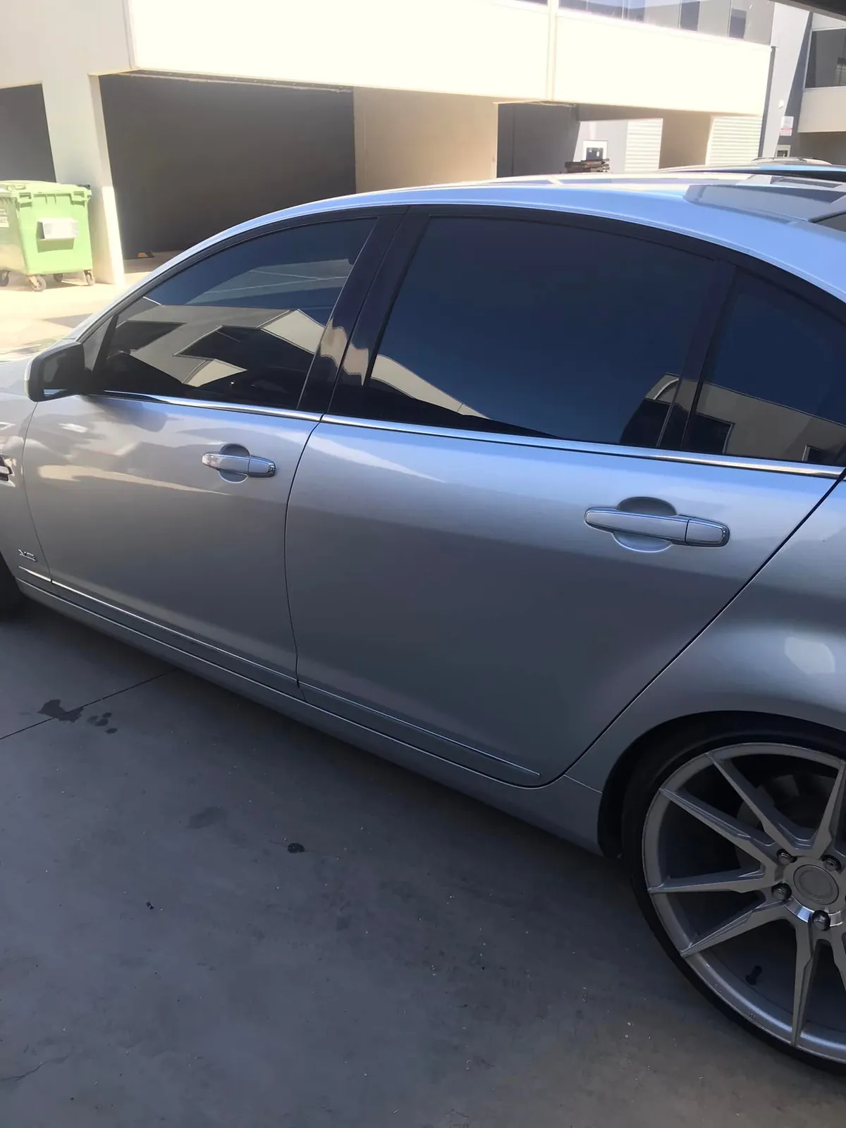 Car with professional window tint by KEN Express