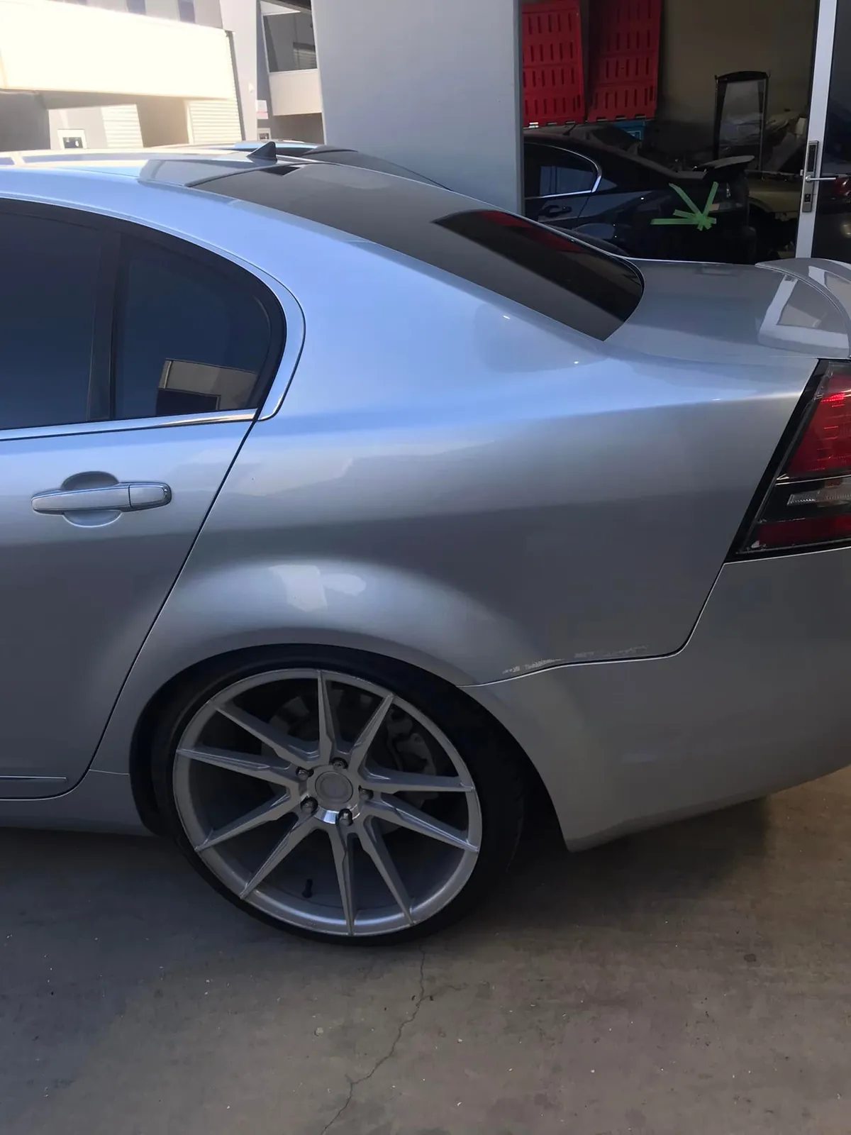 Car with professional window tint by KEN Express
