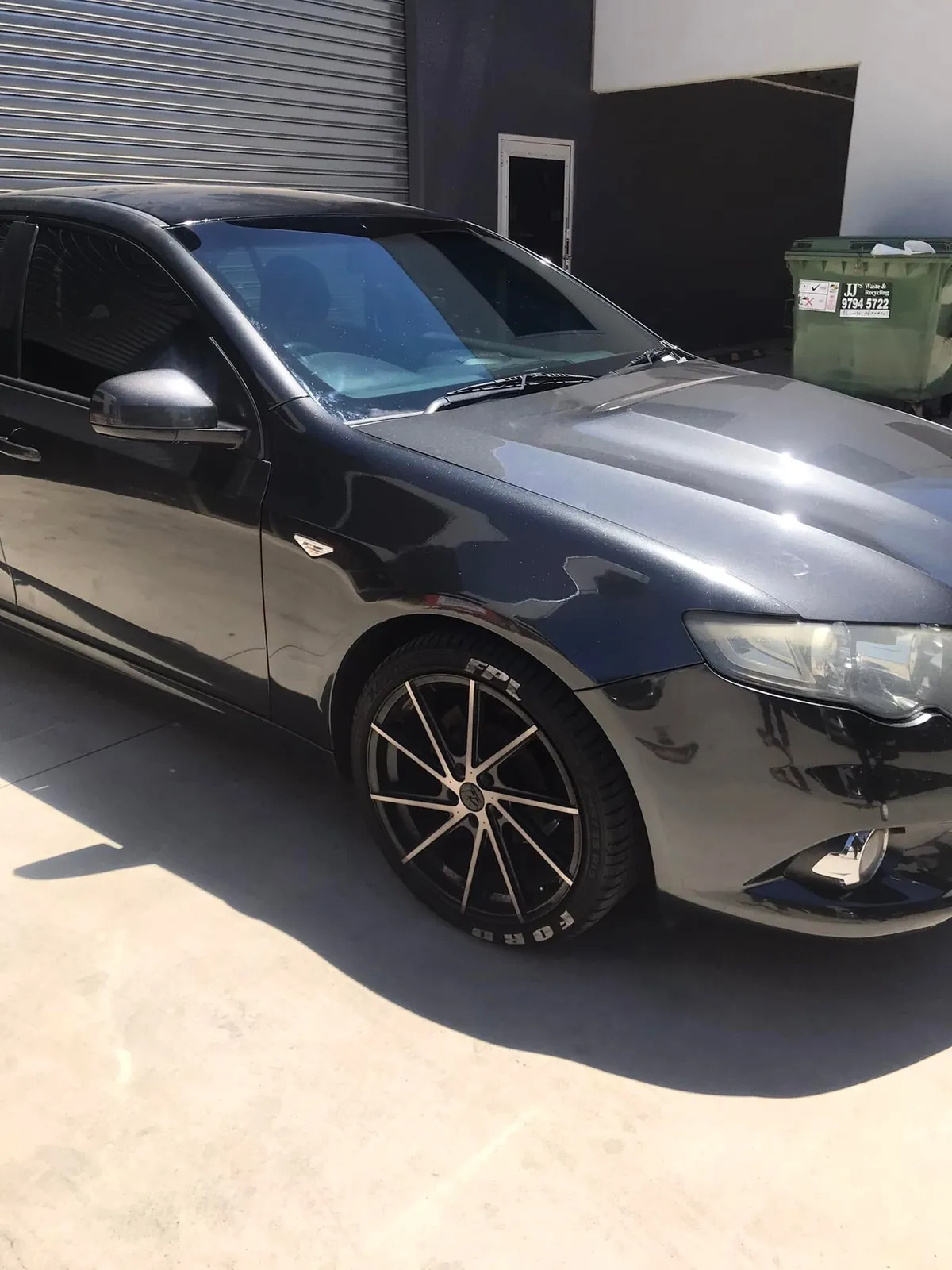 Car with professional window tint by KEN Express
