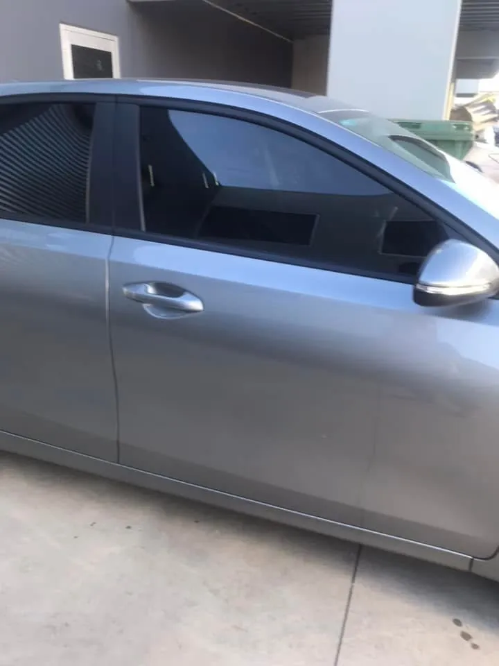 Car with professional window tint by KEN Express