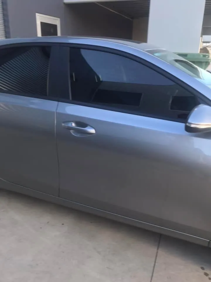 Car with professional window tint by KEN Express