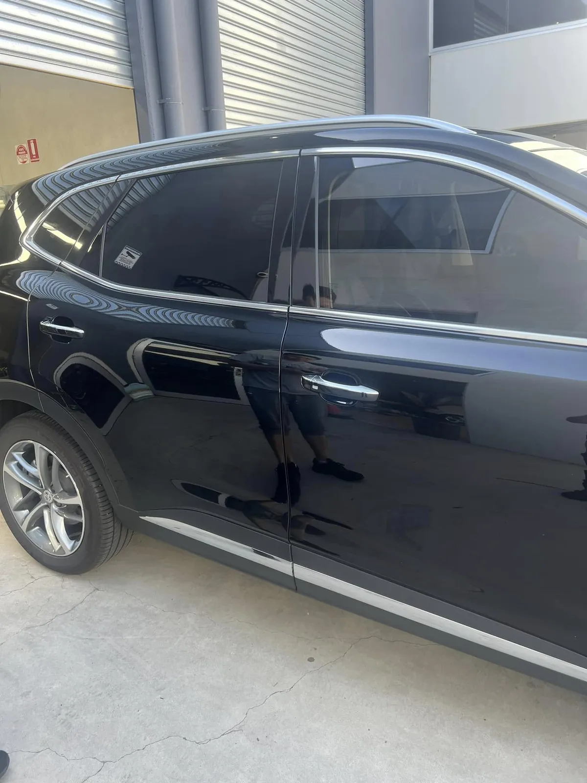 Car with professional window tint by KEN Express