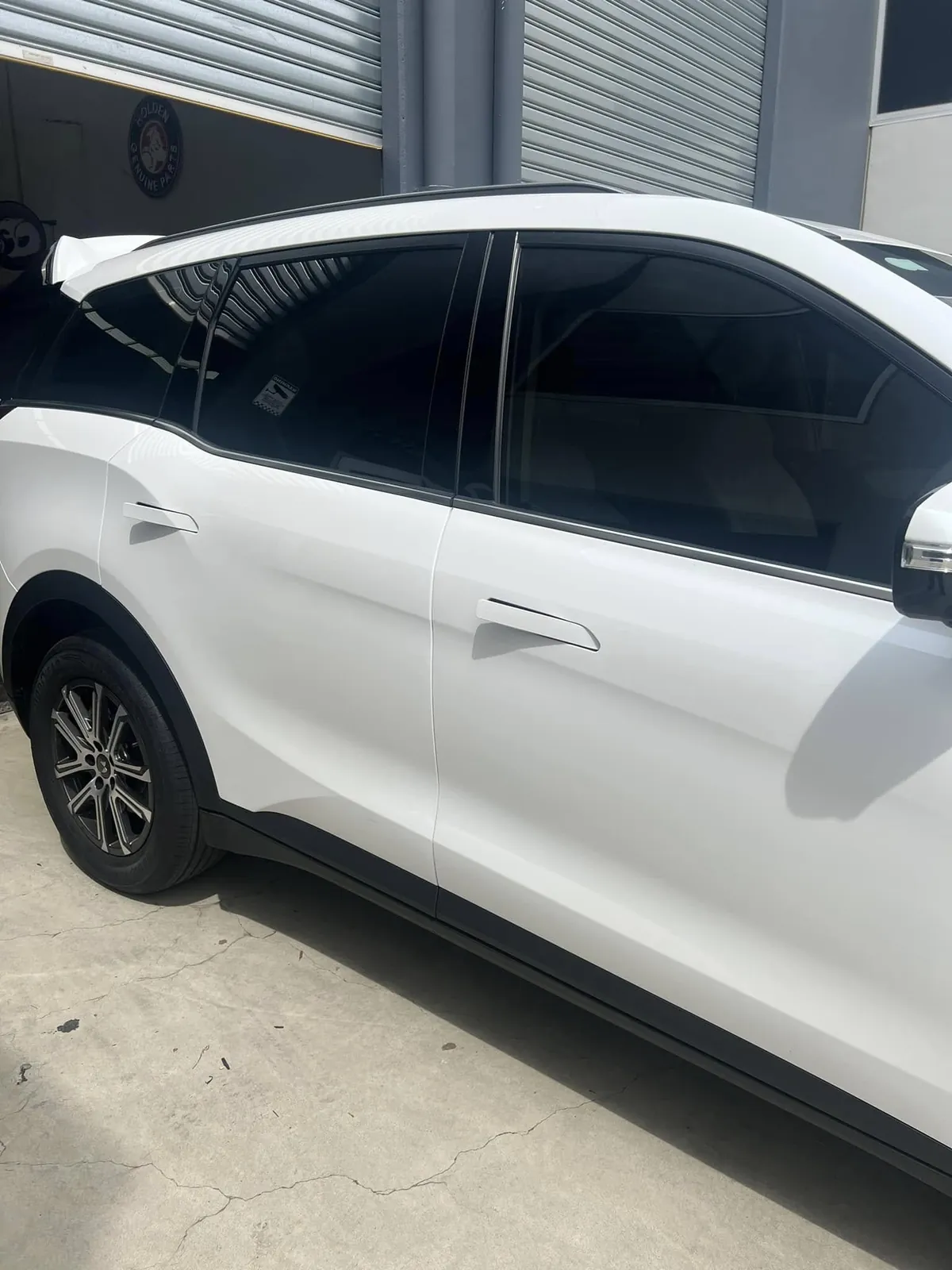 Car with professional window tint by KEN Express