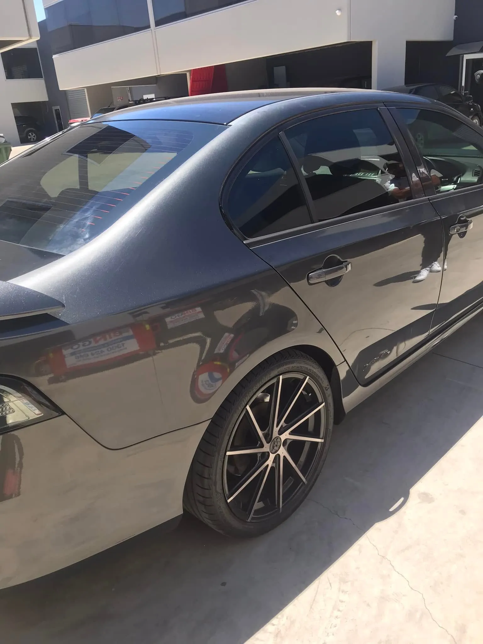 Car with professional window tint by KEN Express
