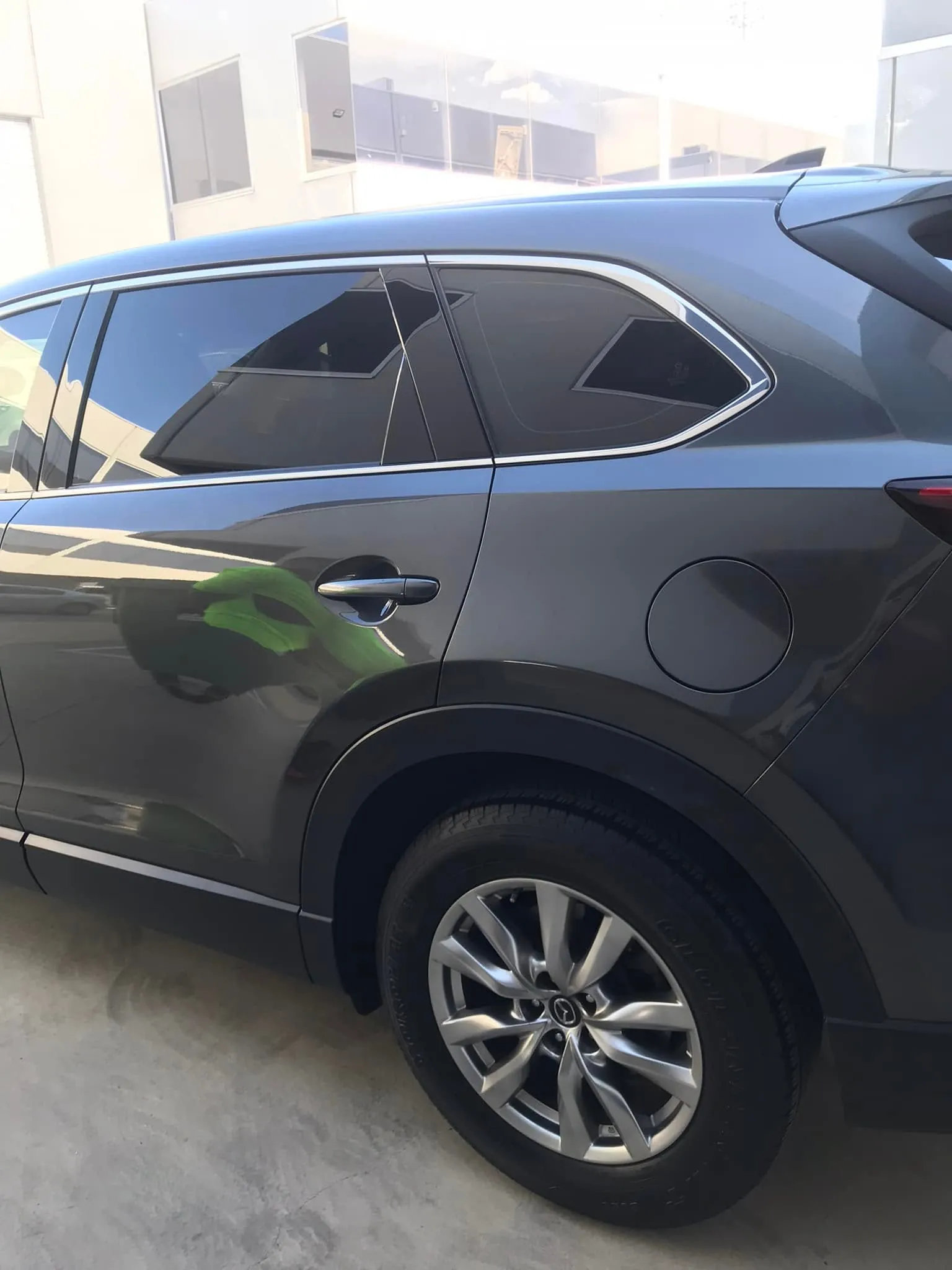Car with professional window tint by KEN Express