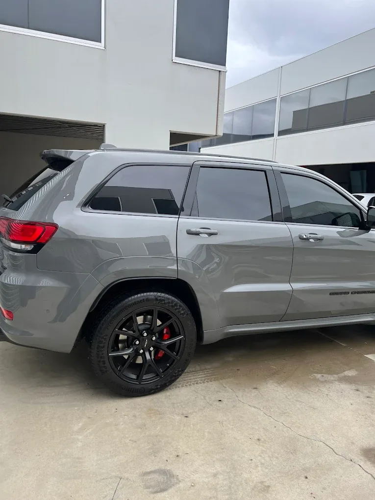 Car with professional window tint by KEN Express
