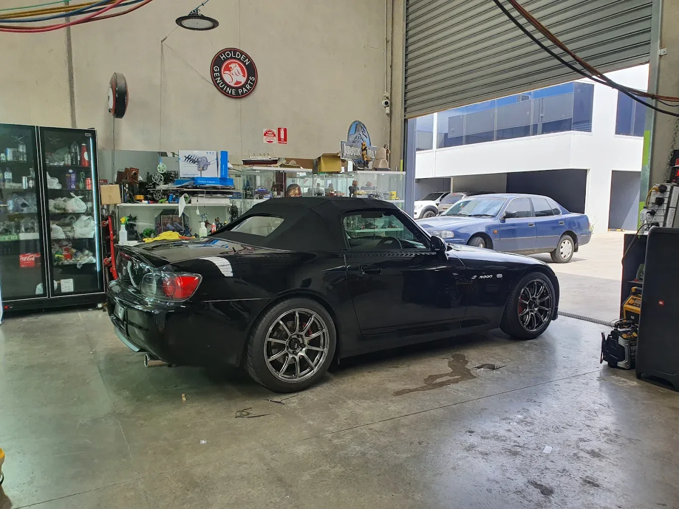 Car being tinted inside the KEN Express workshop in Truganina